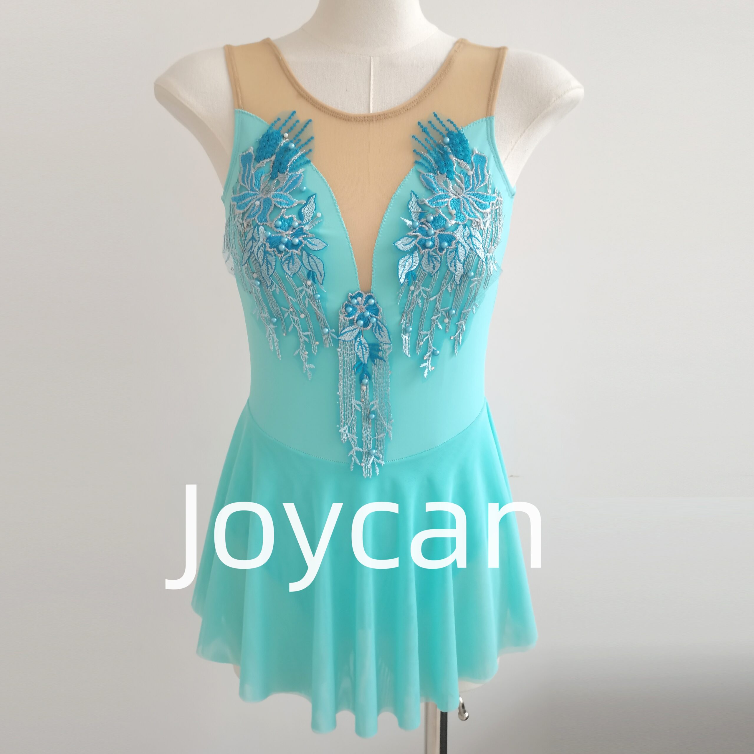 The Allure of Blue: Choosing the Perfect Sleeveless Figure Skating Dress with Applique